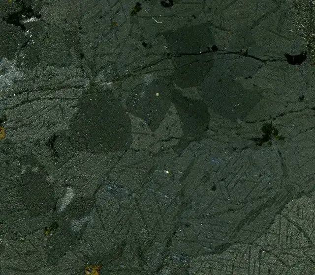 Nelsonite, a dense black igneous rock rich in iron-titanium oxides and apatite, from Wyoming