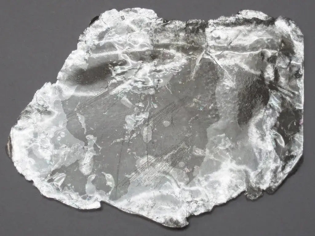 Hand specimen of muscovite mica showing stacked, platy cleavage sheets