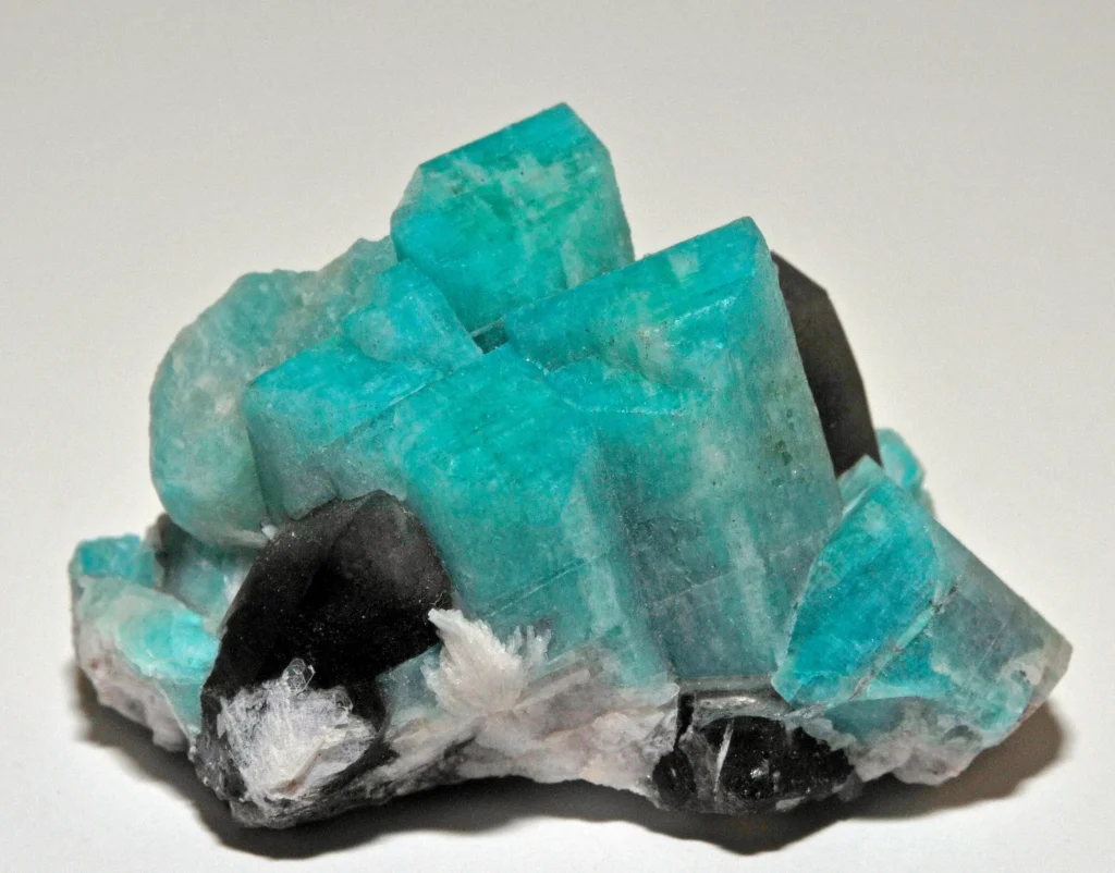 Green amazonite microcline intergrown with smoky quartz from Colorado