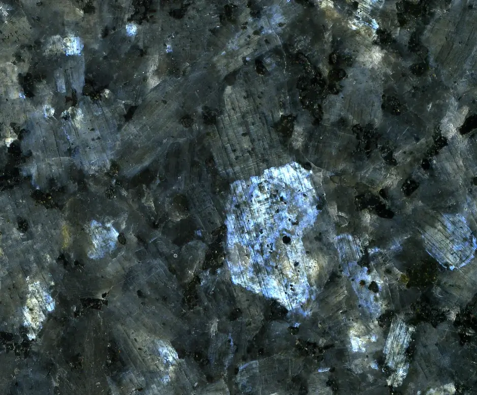 Polished Blue Pearl larvikite slab from the Larvik Batholith, Norway, showing blue schiller