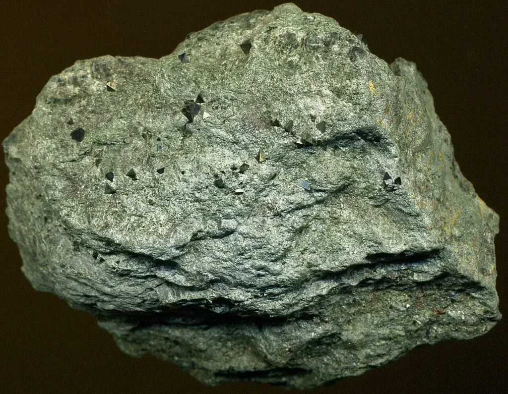 Green chlorite schist from Jarrettsville, Maryland, dotted with black octahedral magnetite crystals