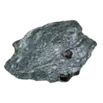 Greenish metamorphic rock with embedded reddish garnet crystals