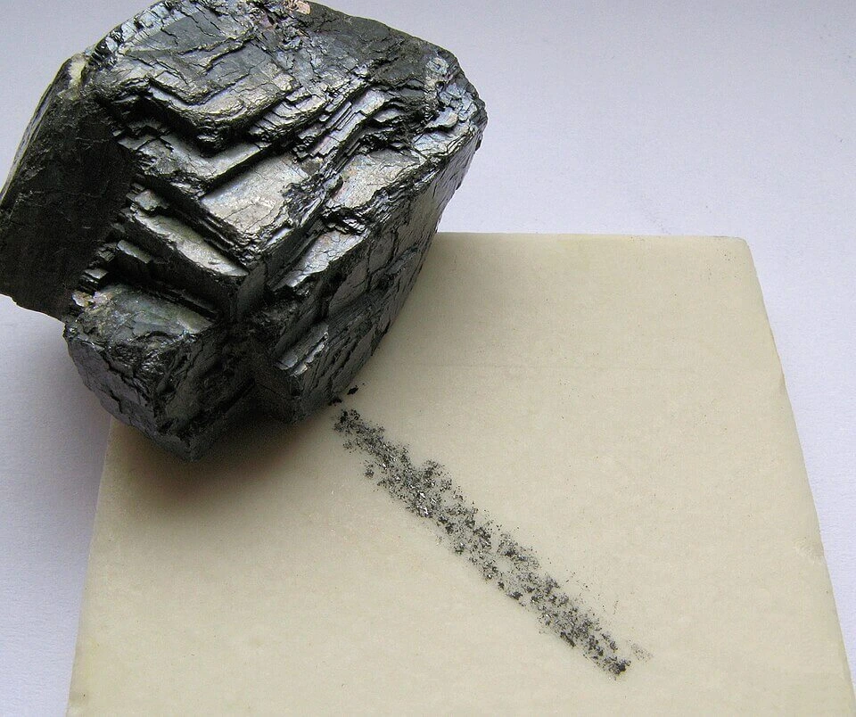 Grey-black streak left by galena on a white porcelain streak plate