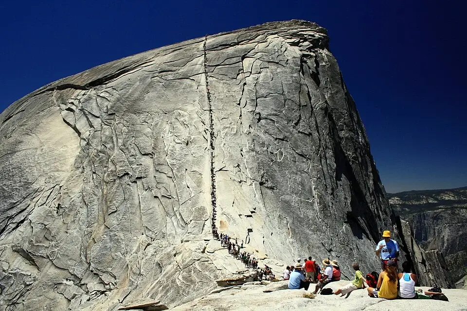 Half Dome granite cliff in Yosemite National Park, California, viewed from valley floor