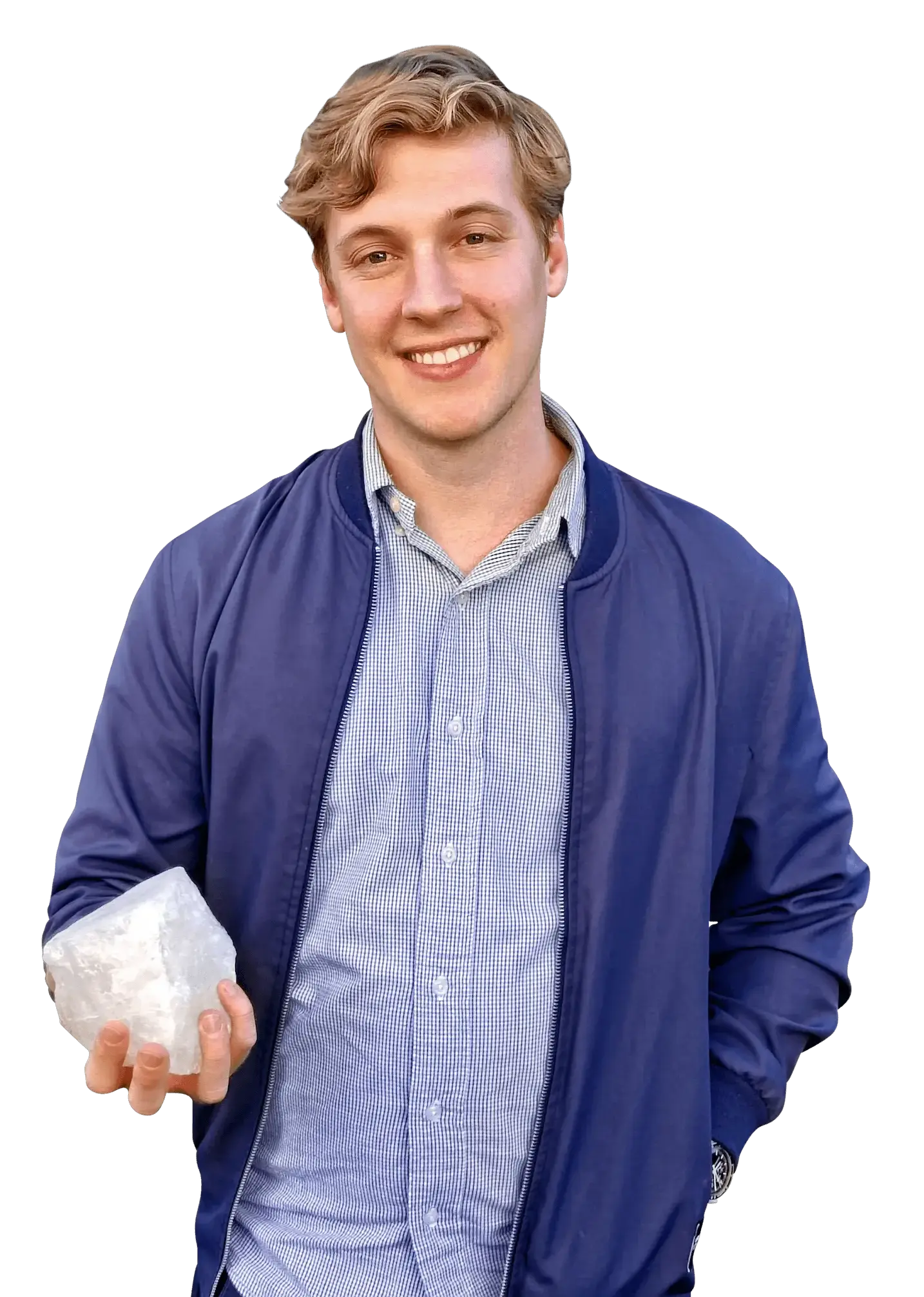 Smiling man holding a large white crystal (Pascal founder of Geoscopy)