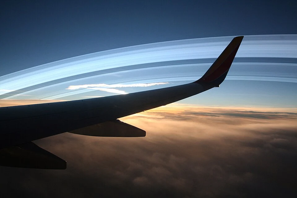 Aerial visualization of Earth's hypothetical Saturn-like ring system as seen from altitude