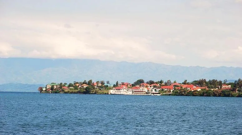 The city of Goma on the northern shore of Lake Kivu, beneath the active Virunga volcanoes including Nyiragongo