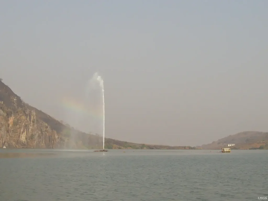 The engineered degassing fountain at Lake Nyos shoots gas-rich water into the air, venting carbon dioxide to prevent another limnic eruption