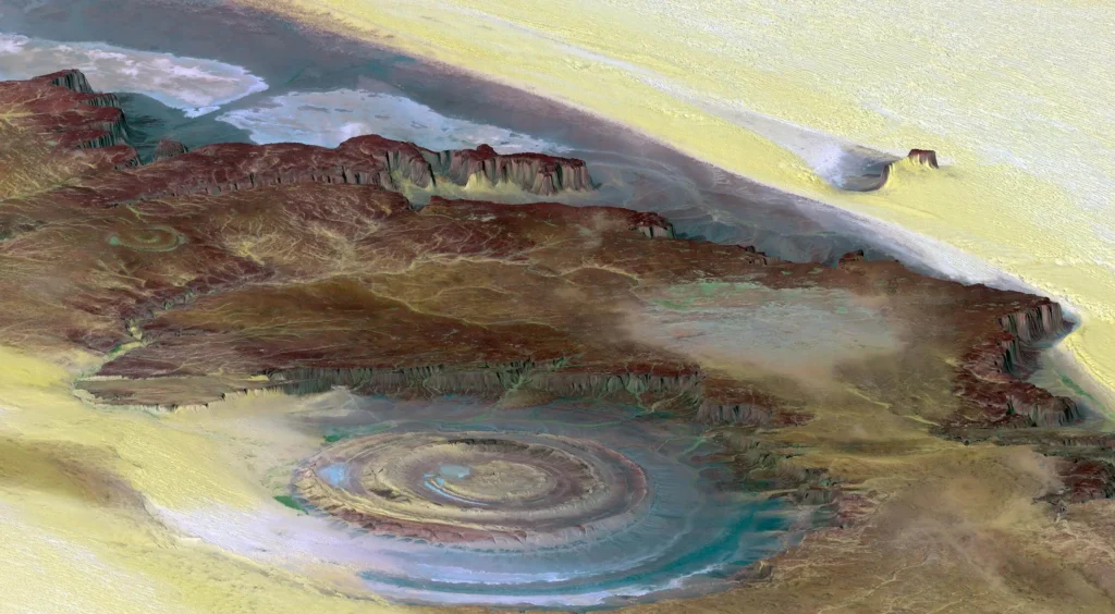 Three-dimensional perspective view of the Richat Structure from Landsat draped over SRTM elevation data, showing the eroded dome's concentric ridges and surrounding dunes in relief.