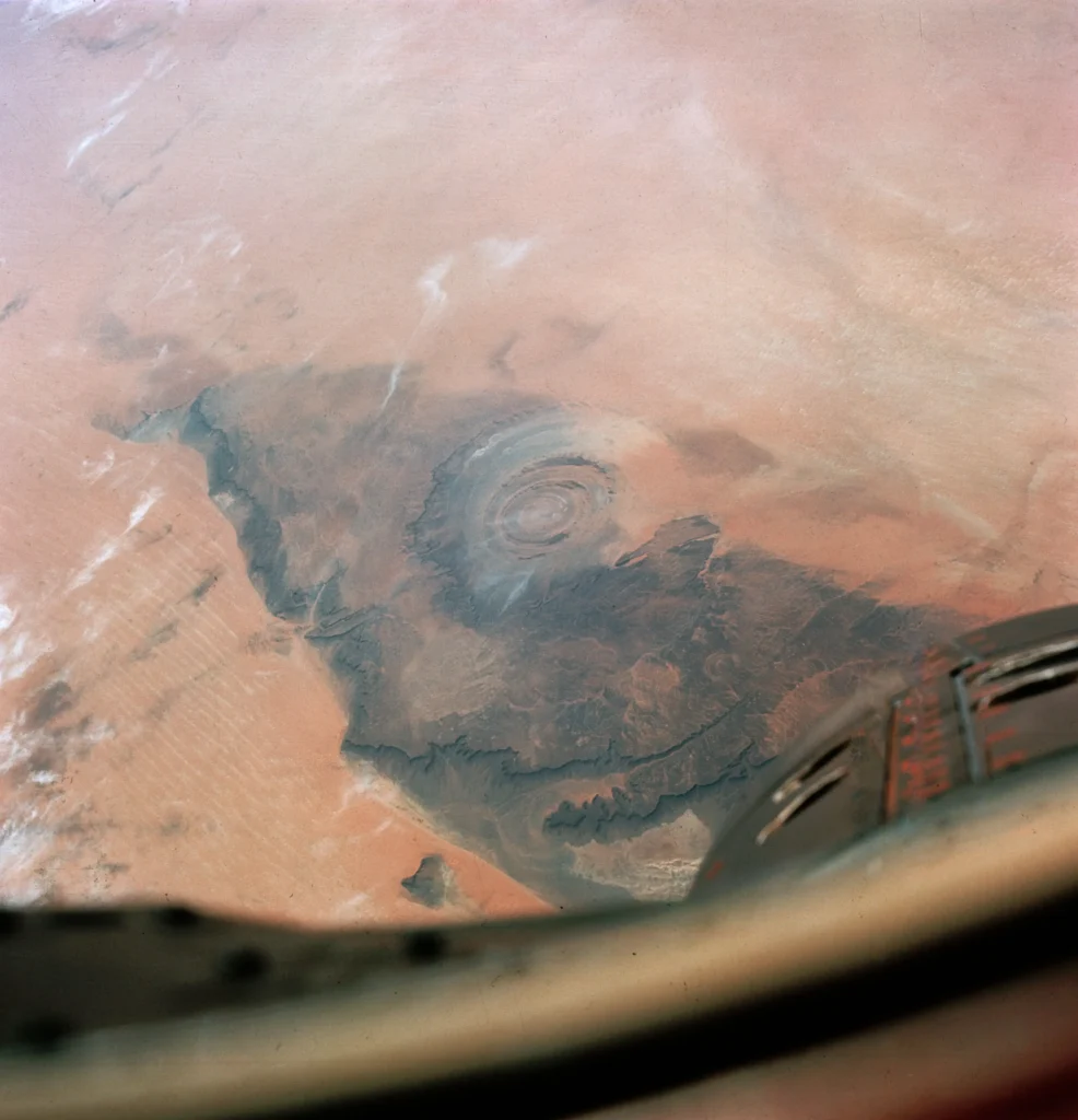 The Richat Structure photographed from the Gemini IV spacecraft in June 1965, the first image of the Eye of the Sahara taken from space.
