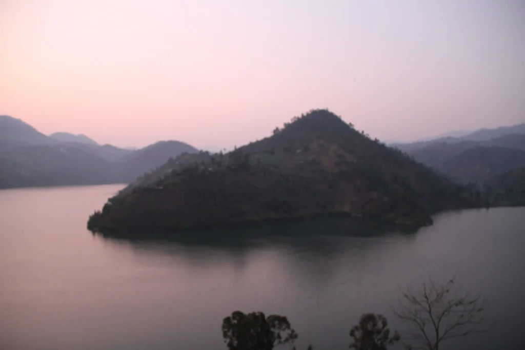 Sunrise over the calm surface of Lake Kivu, on the Rwanda-DR Congo border, where about two million people live above a deep reservoir of dissolved CO2 and methane