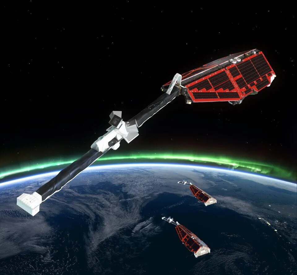 Artist's impression of the three identical ESA Swarm satellites in low Earth orbit measuring components of Earth's magnetic field