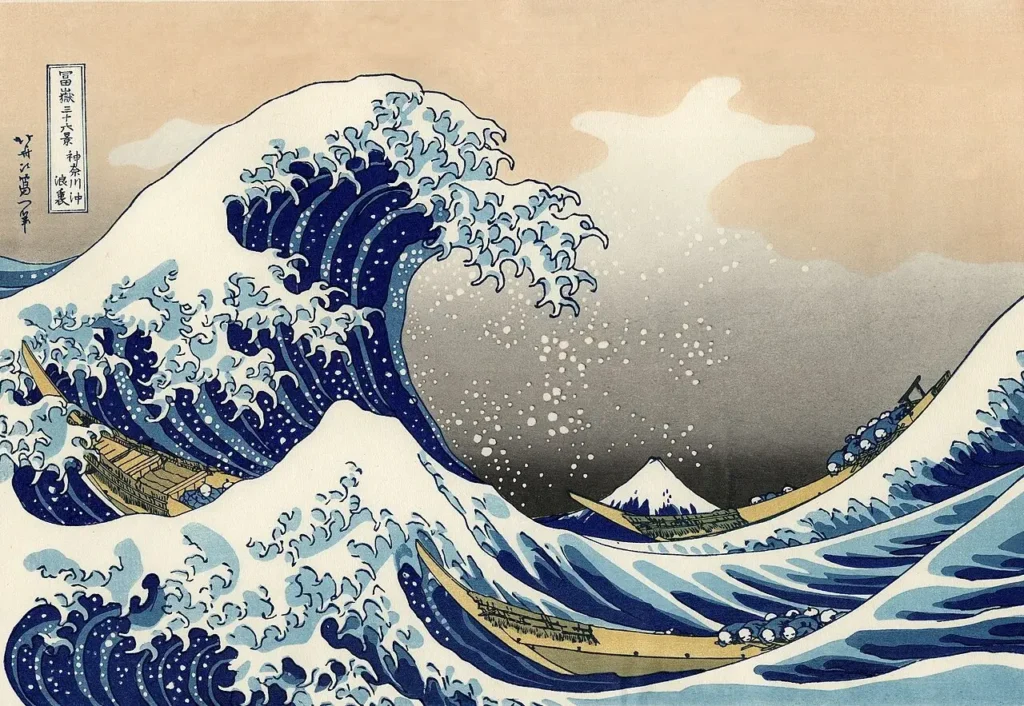 Katsushika Hokusai's woodblock print The Great Wave off Kanagawa, showing a towering offshore wave with three boats and Mount Fuji in the distance.