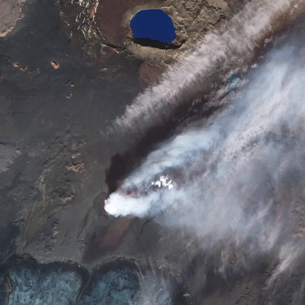 False-color satellite image of the 2014 Holuhraun fissure eruption in Iceland, a modern small-scale analog for Siberian Traps flood basalt volcanism during the end-Permian extinction.