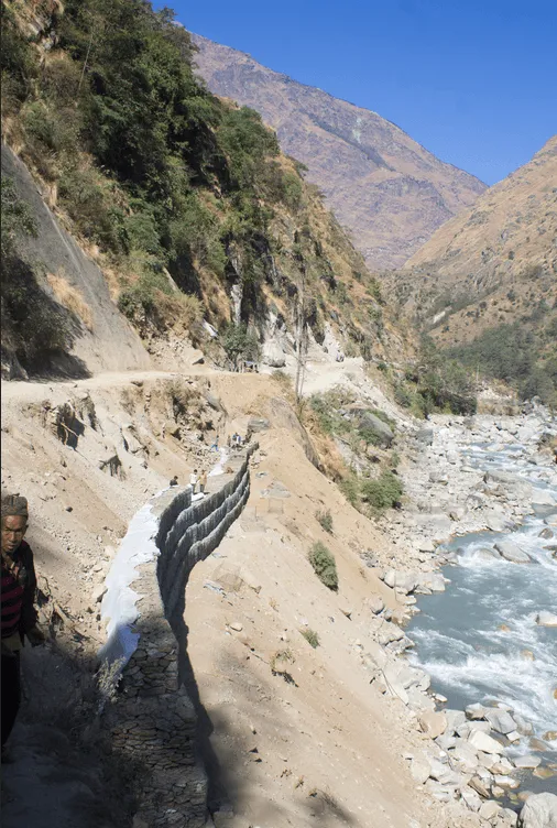 The Kali Gandaki Gorge near Dana, Nepal, a major Himalayan river cutting a deep canyon between high mountain walls.