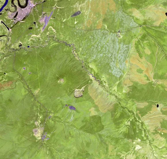 2024 Landsat satellite image of the Batagaika crater in Siberia, showing the greatly enlarged permafrost megaslump after decades of thaw-driven growth