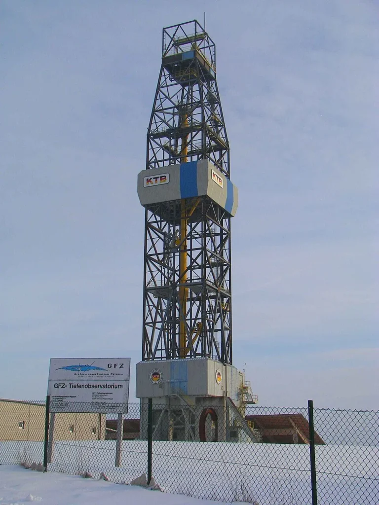 The tall steel drilling derrick of Germany's KTB superdeep borehole rising against the sky at Windischeschenbach, Bavaria.