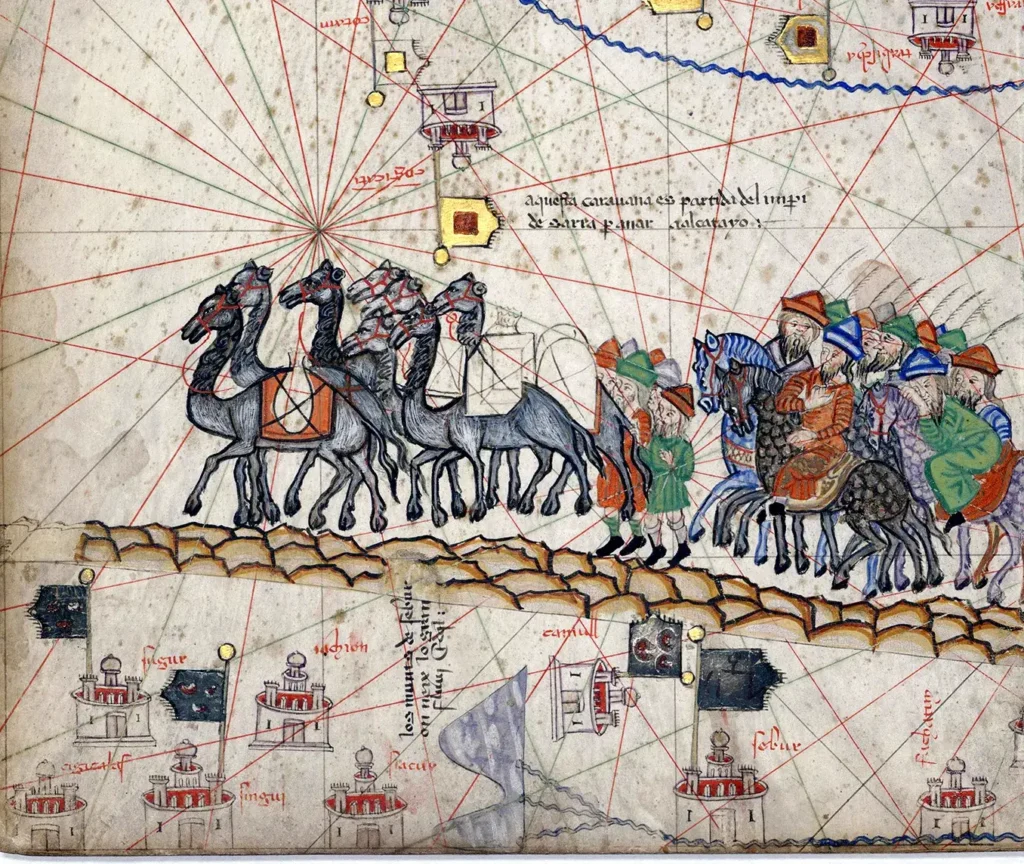 Medieval illustration of a Silk Road camel caravan crossing the desert, from the 1375 Catalan Atlas