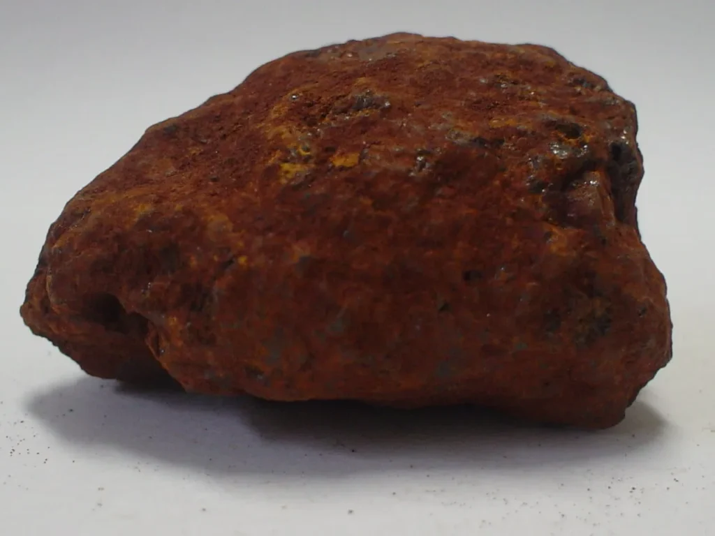 Metallic grey hematite specimen with a reddish sheen