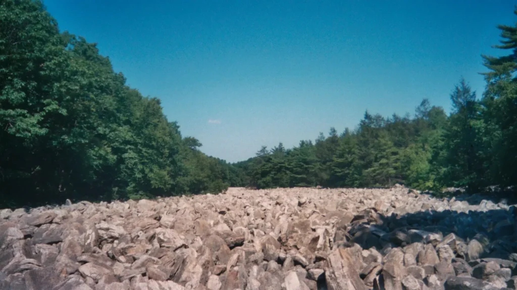 A treeless river of boulders running through forest at Hawk Mountain, Pennsylvania, a periglacial block field