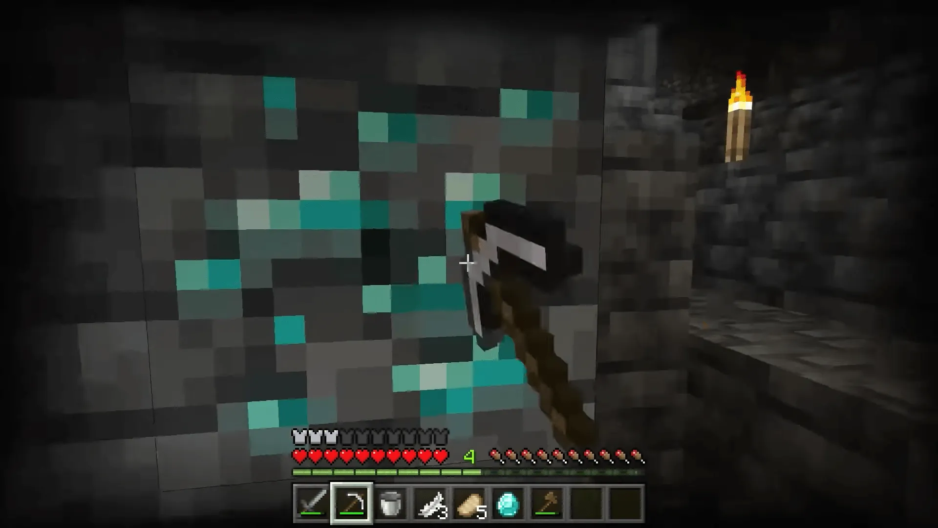 Screenshot of a player mining for diamond in Minecraft