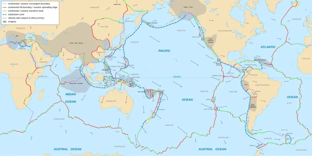 World map of tectonic plate boundaries showing divergent, convergent, and transform margins, including the Caribbean plate