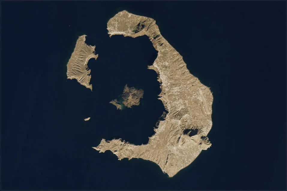 Satellite view of the flooded Santorini caldera with the Kameni islands at its center, captured by Landsat 9 in December 2024