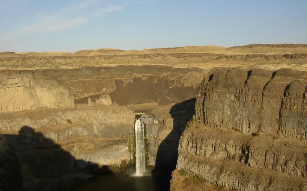 Palouse Falls dropping into a flood-carved basalt canyon