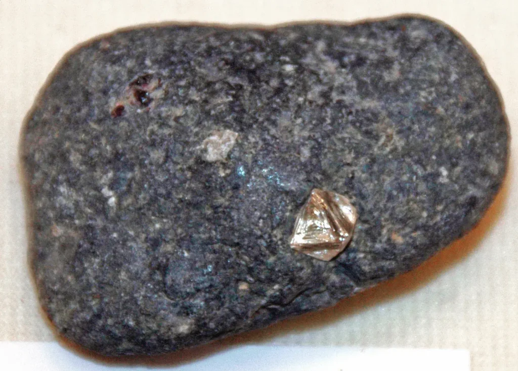 A diamond embedded in kimberlite rock, both delivered from deep in Earth's mantle by a volcanic eruption