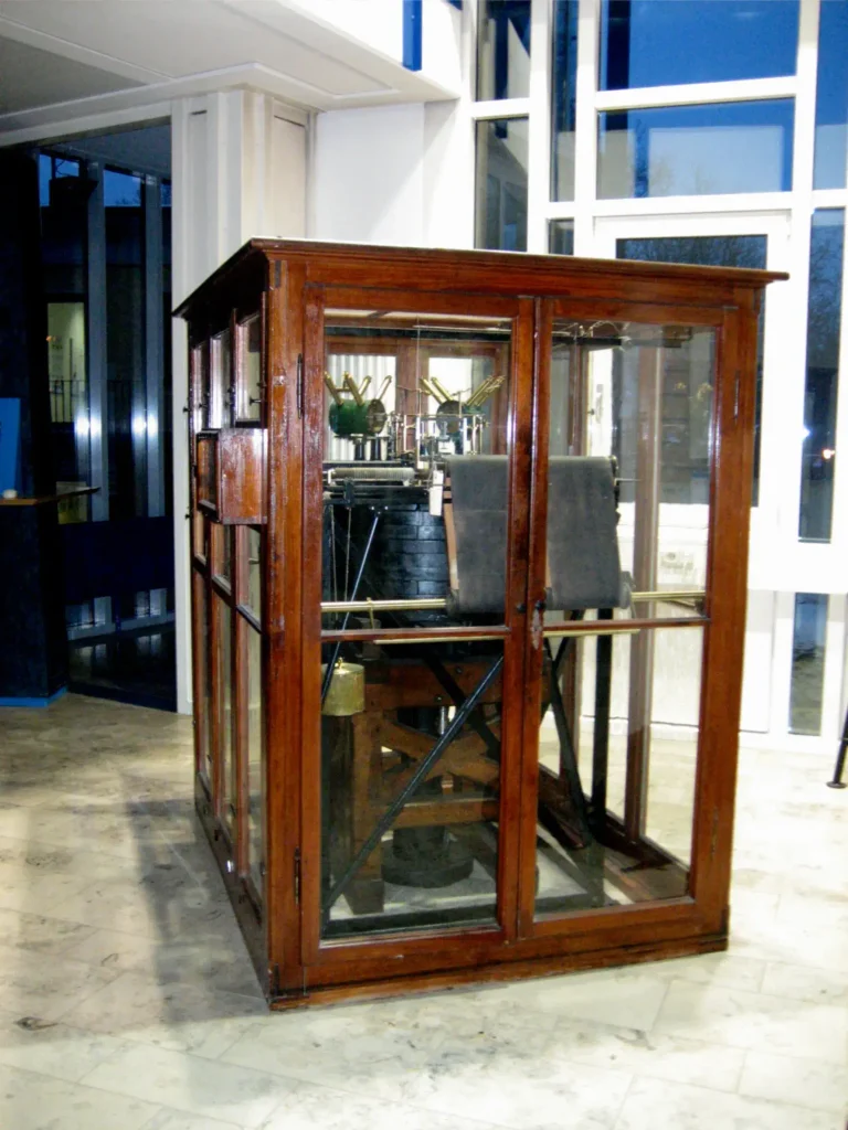 A historical Wiechert seismograph, an early mechanical instrument used to record earthquake waves and probe Earth's interior
