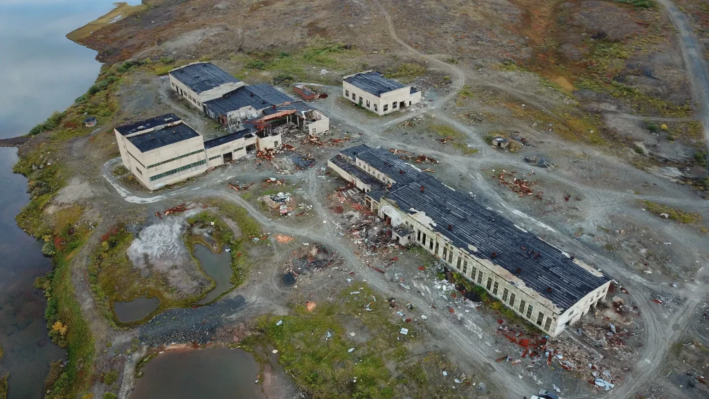 The welded metal cap sealing the Kola Superdeep Borehole, the deepest hole ever drilled, at its abandoned site in Arctic Russia