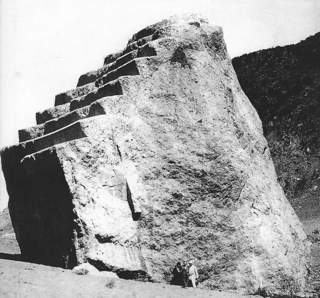 The bare rock face of the east abutment after the failure, stripped of the dam and of the hillside that had held it