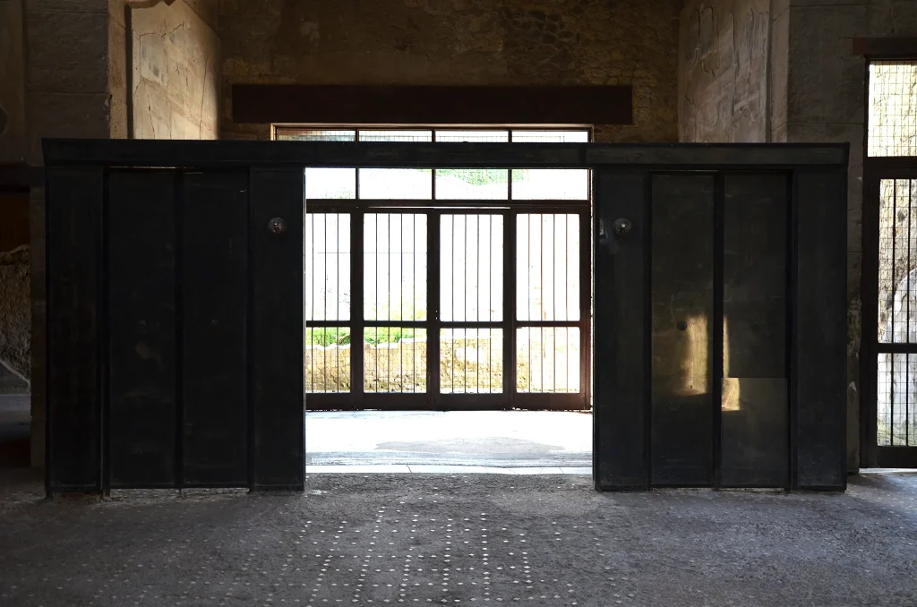 Carbonized wooden partition screen preserved in the House of the Wooden Partition at Herculaneum