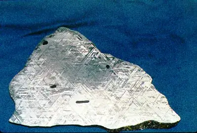 Etched slice of an iron meteorite showing the Widmanstatten pattern, evidence for the iron-nickel composition of planetary cores